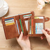 A brown leather wallet with a vintage leopard print design is shown open, displaying various cards on a wooden table.