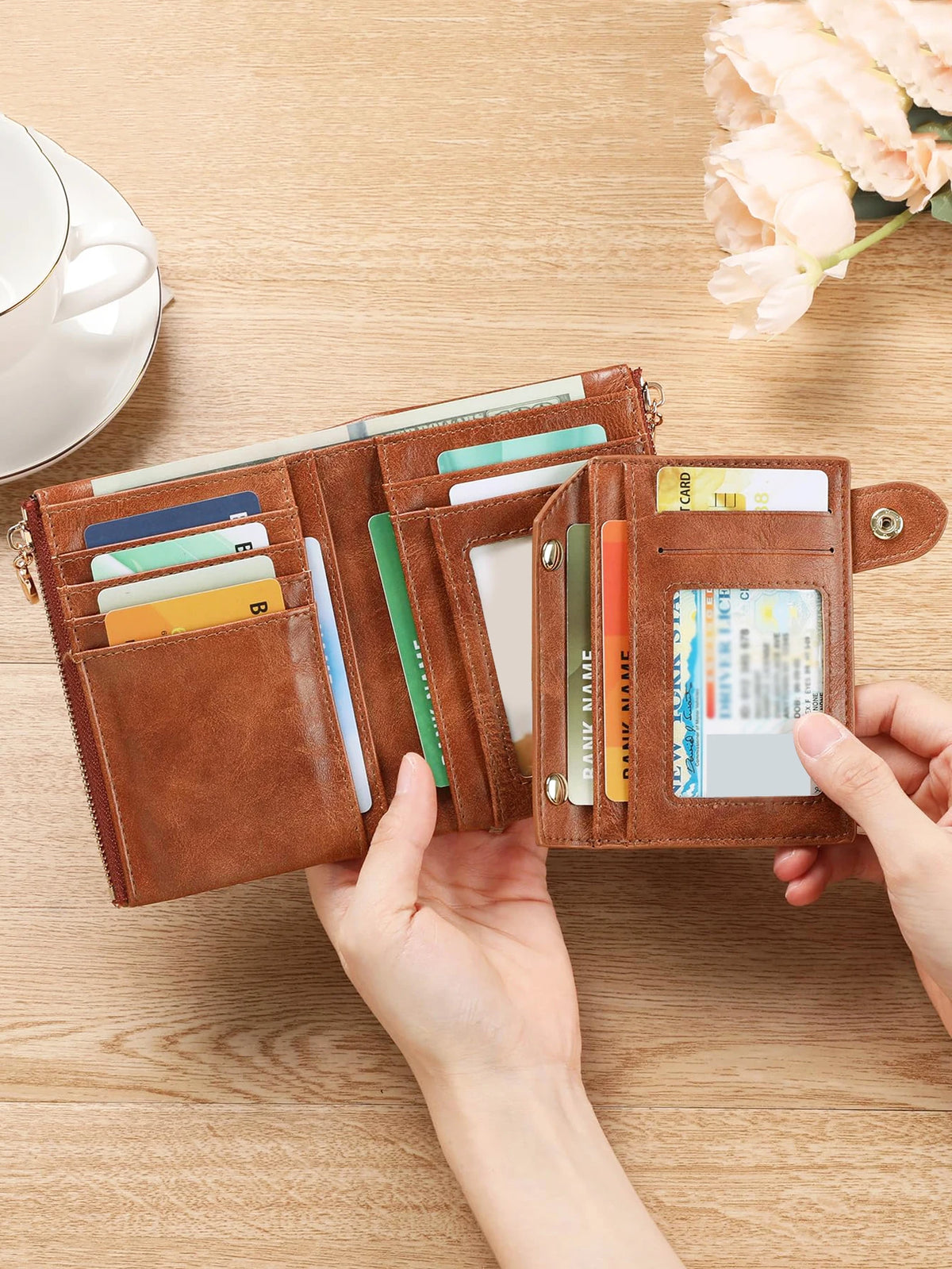 A brown leather wallet with a vintage leopard print design is shown open, displaying various cards on a wooden table.