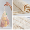 A close-up of a beige reusable cotton mesh produce bag and a section showing the hemming design.