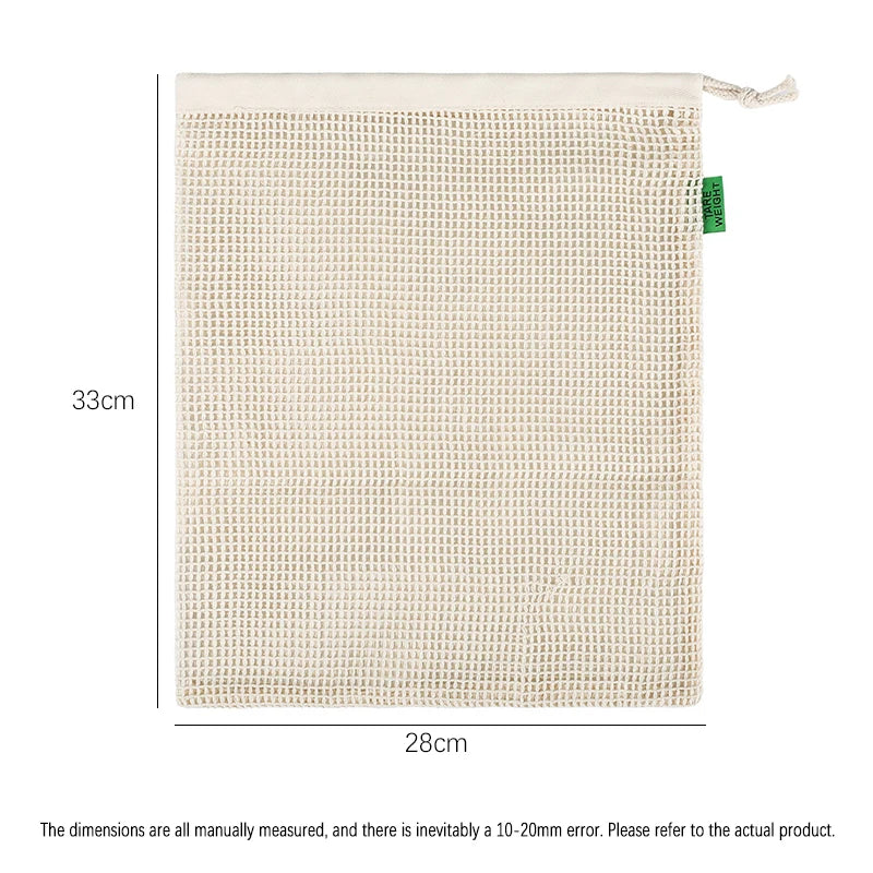 A rectangular beige cotton mesh produce bag with a drawstring closure.