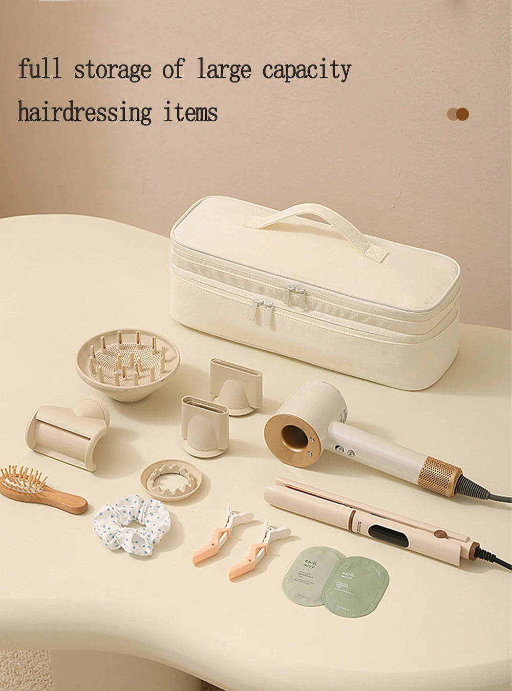 A white storage bag for hairdressing items is shown with various tools like a hair dryer and styling tools laid out on a tabl