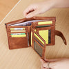 A brown leather wallet with a gold clasp is shown open, displaying various cards and cash inside.