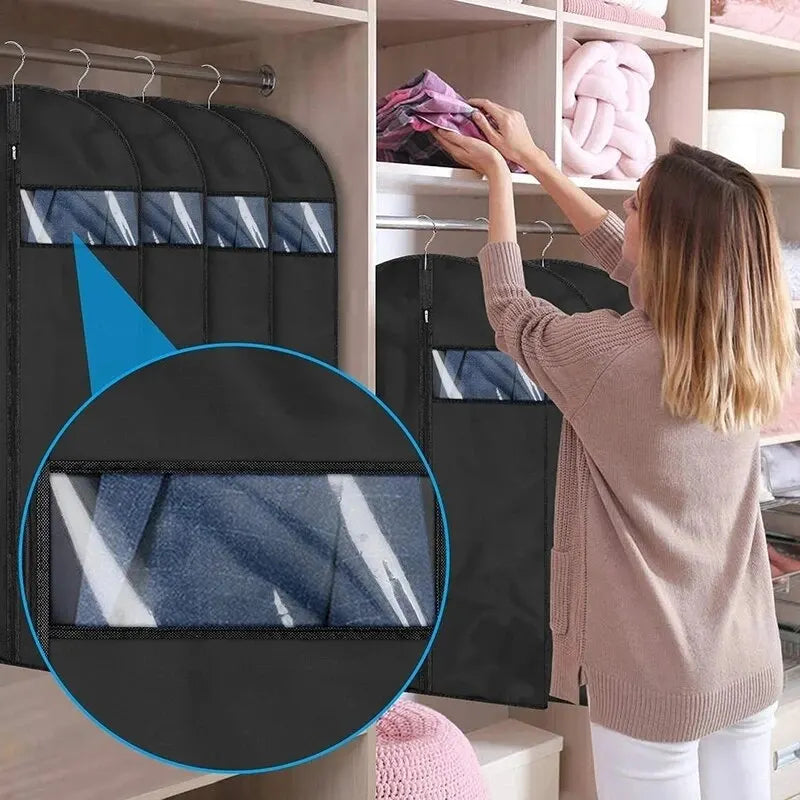 A woman is placing a clear garment dust cover on a hanger in a closet shelf.