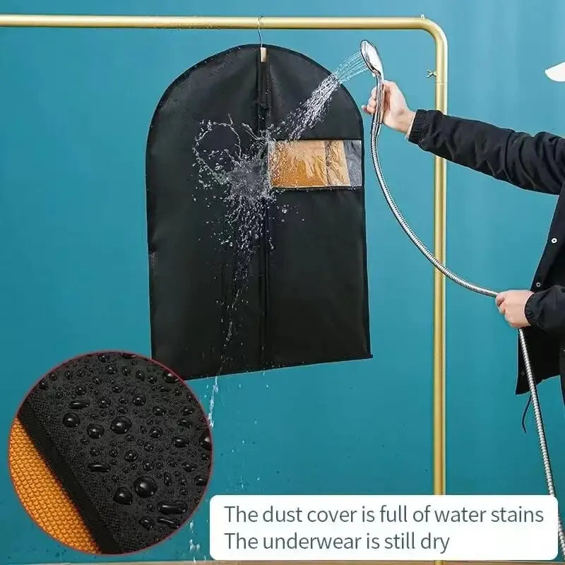 A black garment dust cover is being sprayed with water, showing water stains on the fabric while the underlying underwear rem