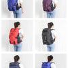 A woman is shown wearing a large capacity travel backpack with a rain cover in various colors and angles.