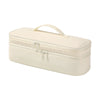 A cream-colored durable travel hair dryer storage bag with a handle and partitioned compartments.