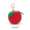 Red apple shaped coin purse keychain with a gold-colored clasp and green leaf detail