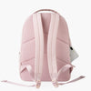 A pink waterproof anti-theft laptop backpack shown from the back with light pink straps.