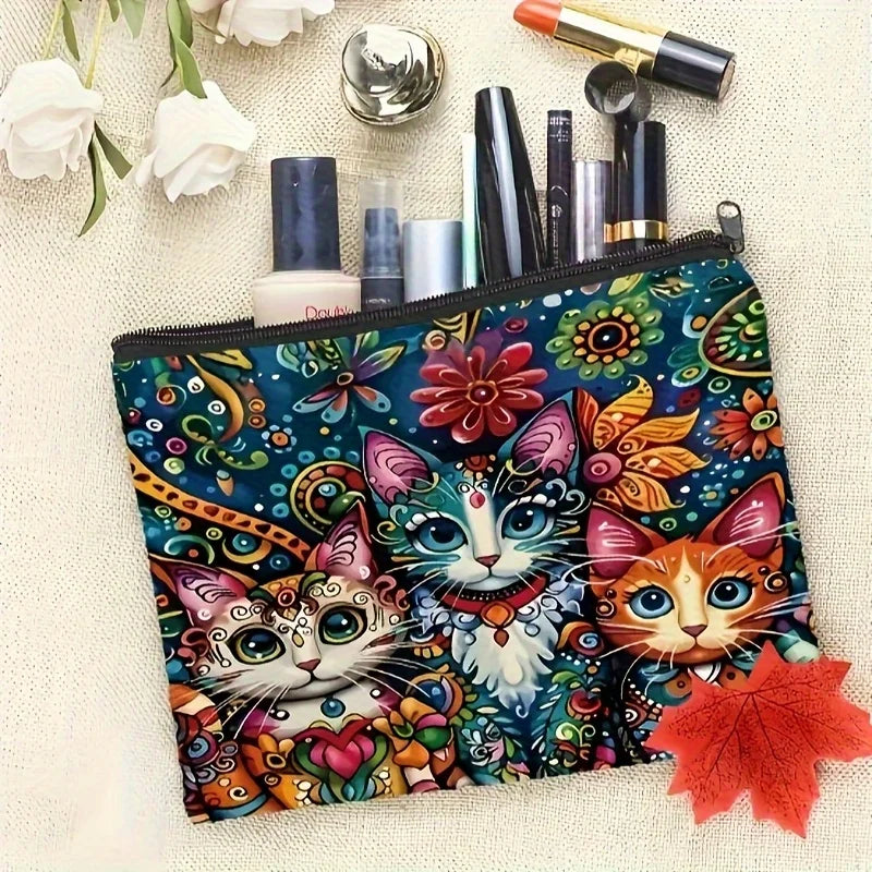 A colorful makeup pouch featuring a cat design with vibrant floral patterns and various cosmetic tools.