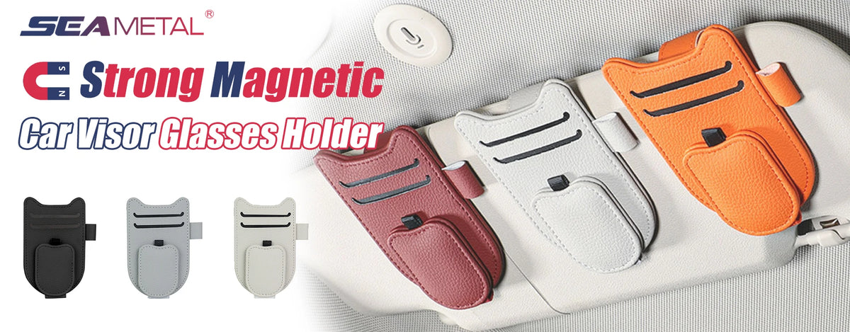 A collection of Strong Magnetic Car Visor Glasses Holders in various colors resting on a light-colored surface.