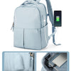 Light blue laptop backpack with an external charging port connected to a smartphone.