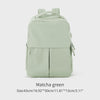 A light green laptop backpack with a top handle and zippered compartments.