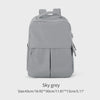 A grey laptop backpack with a top handle and side pocket is shown against a light background.
