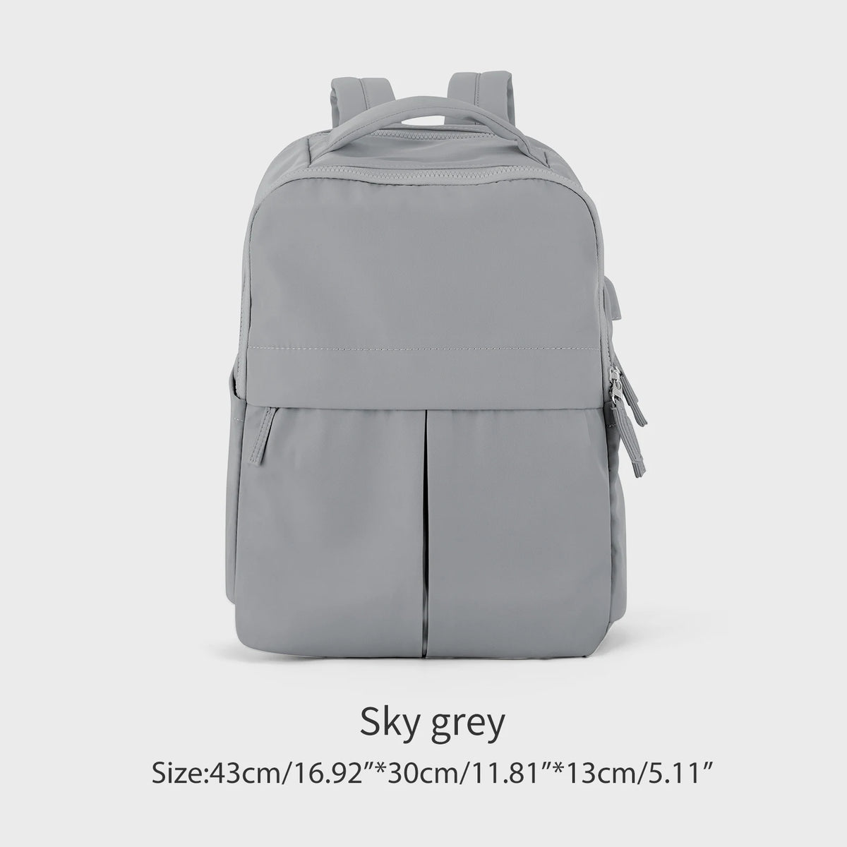 A grey laptop backpack with a top handle and side pocket is shown against a light background.