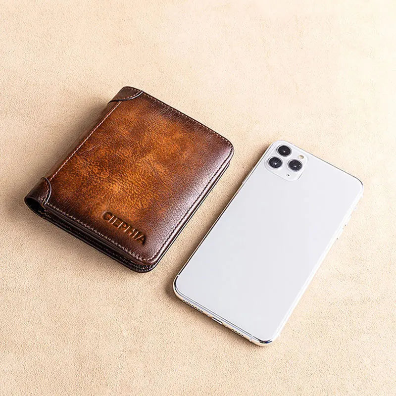 A brown genuine leather wallet and a white smartphone are displayed on a light background.