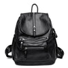 Black vintage soft leather backpack for women with a zipper closure