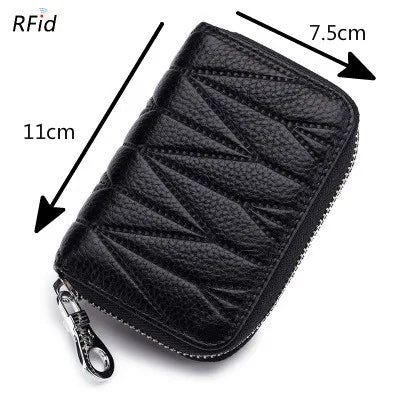 Black genuine leather RFID women's travel wallet with zipper closure shown from above.