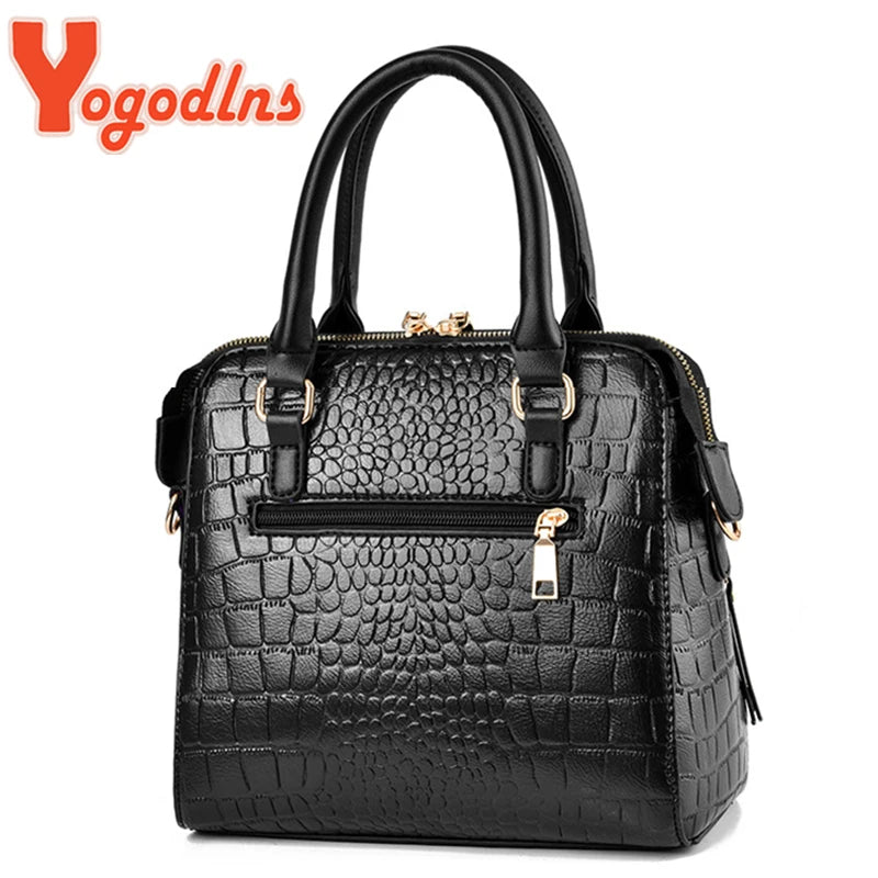 Black crocodile-embossed leather tassel shoulder bag with gold hardware