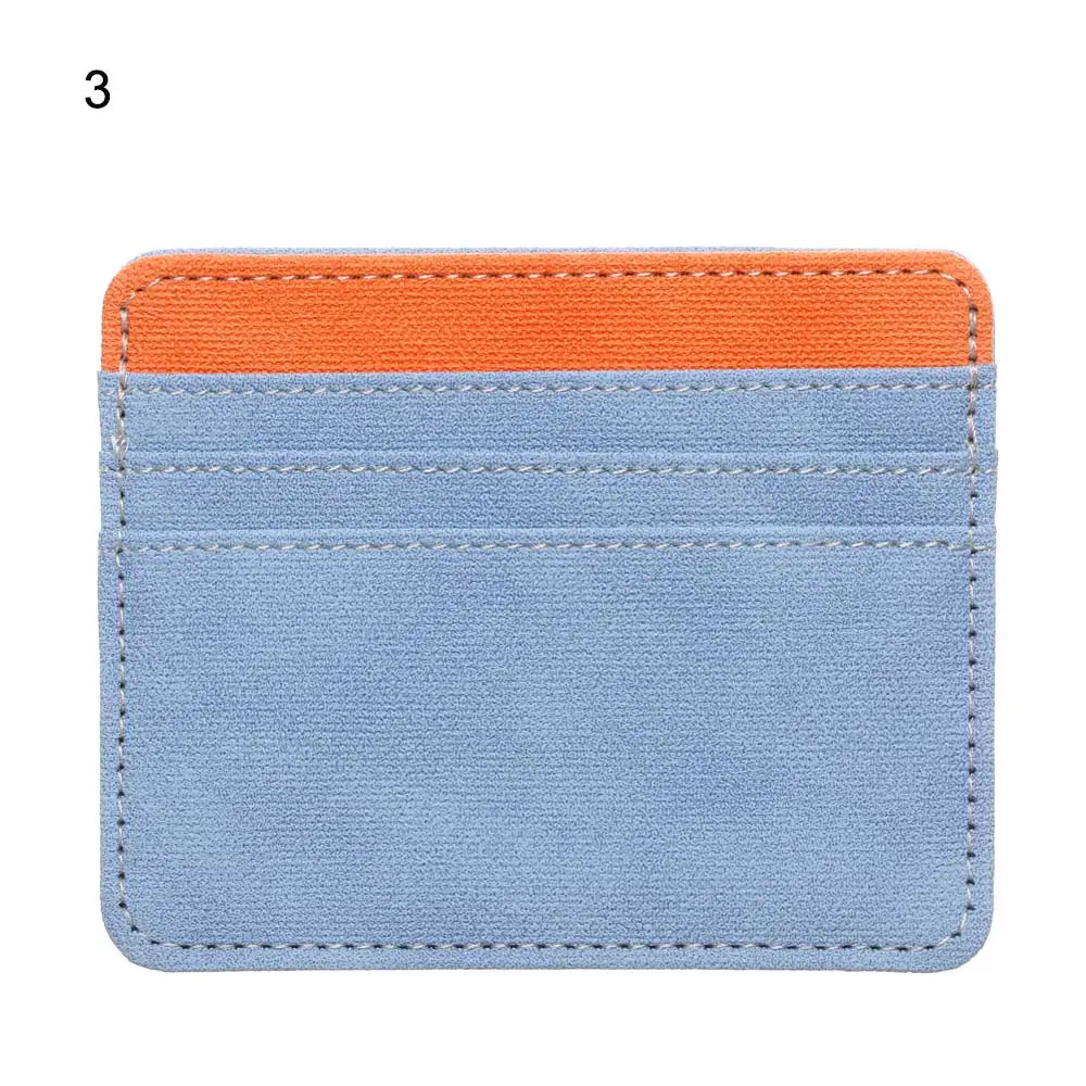 A rectangular card holder wallet made of blue and orange PU leather with stitched edges.