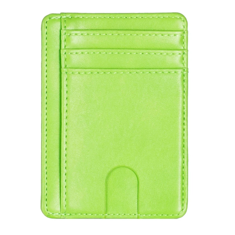 A lime green slim leather card holder wallet with stitched lines and a cutout for cards.