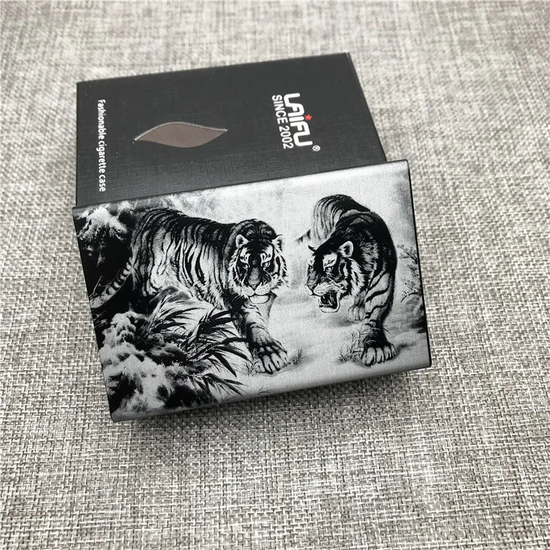 A black and white illustration of a tiger and a wild cat on a cigarette case.