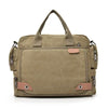 A tan canvas crossbody messenger bag with brown trim and hardware.