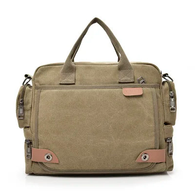 A tan canvas crossbody messenger bag with brown trim and hardware.