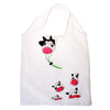 Sac de shopping cartonné blanc et pliable, écologique, avec un motif vache noir et blanc.