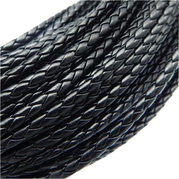 Close-up view of black braided leather cord used for jewelry making