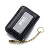 Cartera de cuero negro genuino con ranura para tarjeta protegida RFID y cadena dorada.