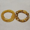 Two strands of colorful belly bead chains, featuring gold and brown beads with white accents.