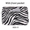 Black and white zebra print laptop sleeve with a front pocket
