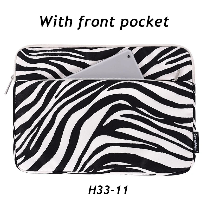 Black and white zebra print laptop sleeve with a front pocket