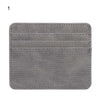 A gray PU leather card holder wallet with a stitched design.