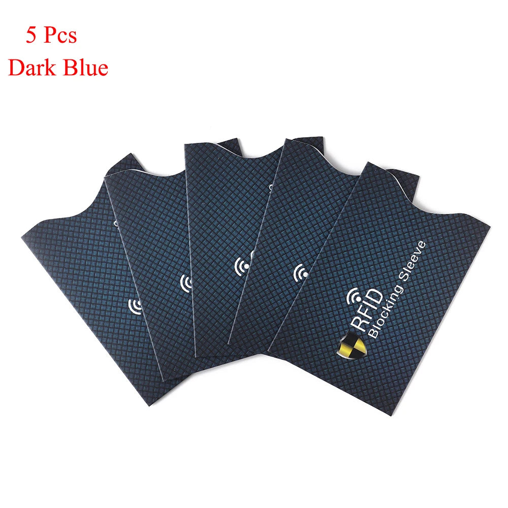 Five dark blue RFID blocking card sleeves laid out flat.