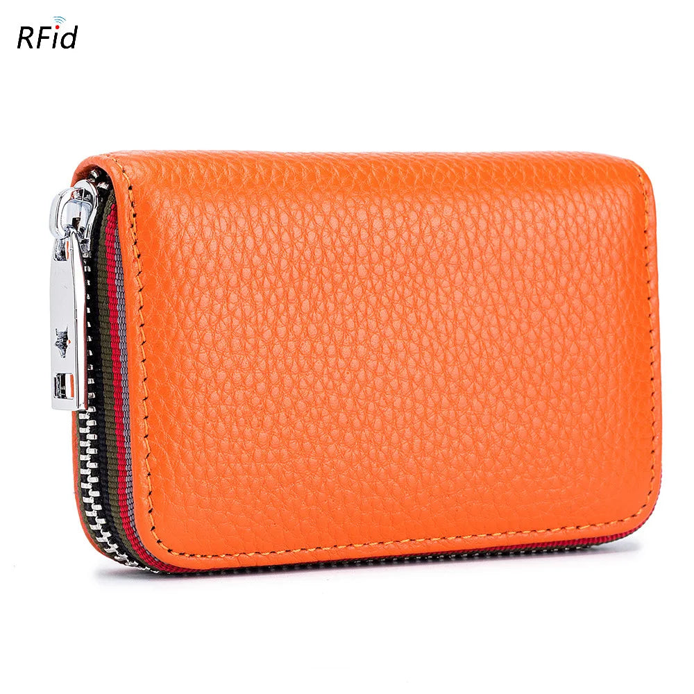 Orange genuine leather accordion card holder wallet with a silver zipper and black stitching