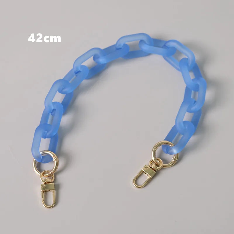 A light blue adjustable detachable chain shoulder bag with a 42cm length.