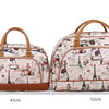 A beige PU leather travel duffel bag with brown handles and a floral cityscape pattern.