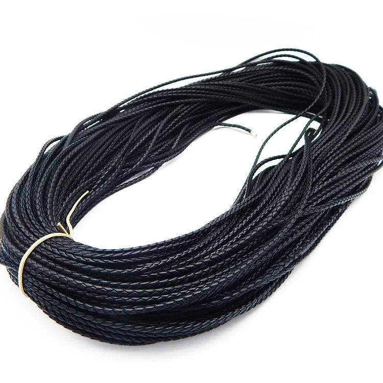 A coil of black braided leather cord used for jewelry making.
