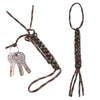 A green and pink 7-strand paracord keychain with a metal lock and utility rope.