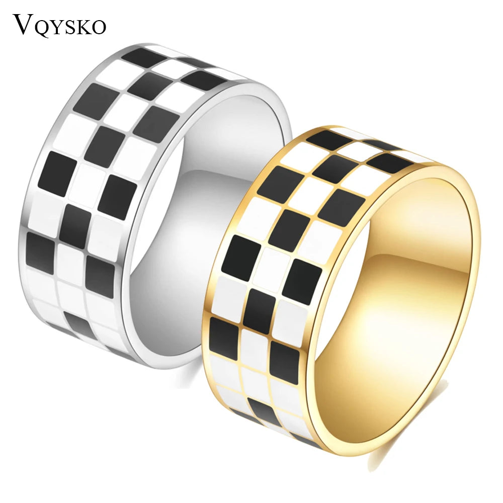 Silver and gold rings featuring a black and white checkerboard pattern.