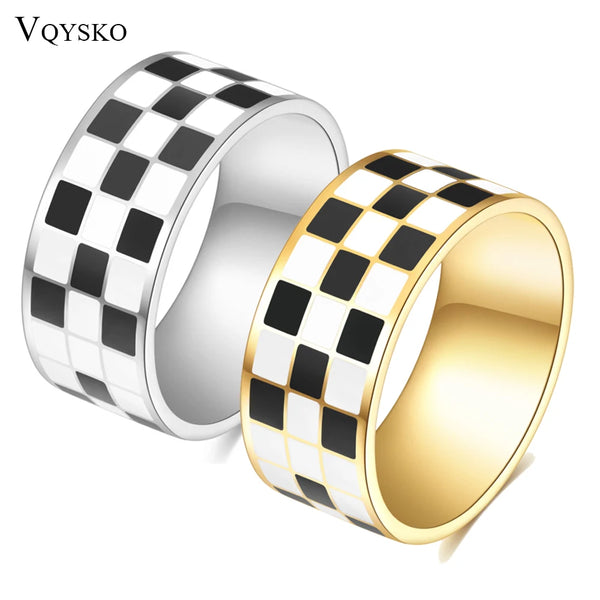 Silver and gold rings featuring a black and white checkerboard pattern.