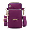 A purple waterproof nylon crossbody bag with gold hardware and a matching strap.