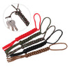 A collection of seven-strand paracord ropes in red, green, black, and brown are displayed with a metal keychain.