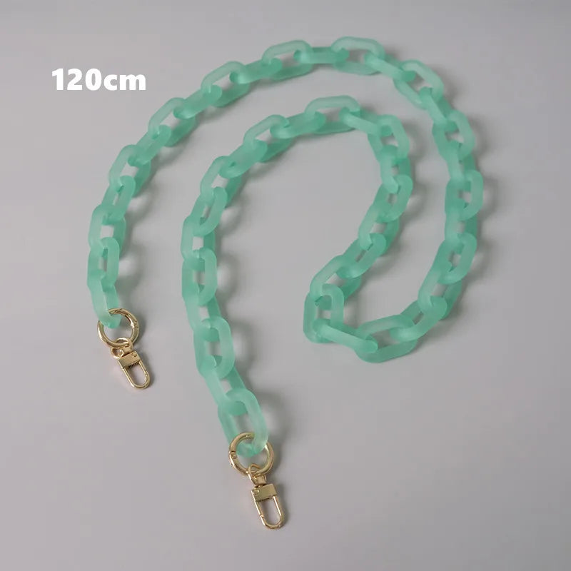 A light mint green adjustable detachable chain shoulder bag with a 120cm length.