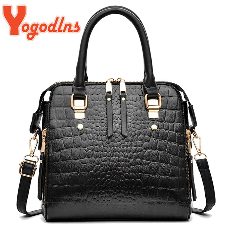 Black crocodile-embossed leather tassel shoulder bag with gold hardware