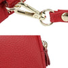 Close-up of a red genuine cowhide leather double-zip wristlet wallet with gold hardware.