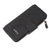 Black elegant PU leather card holder wallet with a zipper closure and leather trim.