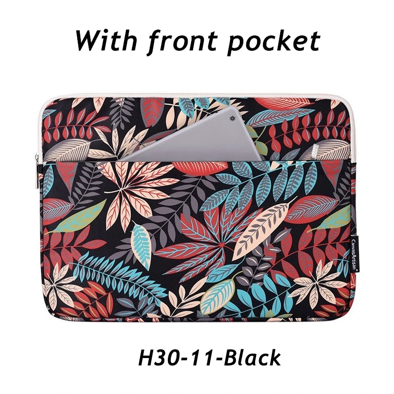 Black laptop sleeve with a front pocket featuring a tropical leaf pattern.