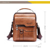 A brown vintage PU leather crossbody messenger bag with a leather strap and brass hardware.